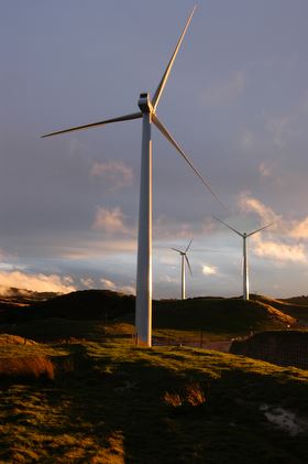 Three turbines on the hills at Te Apiti Wind Farm